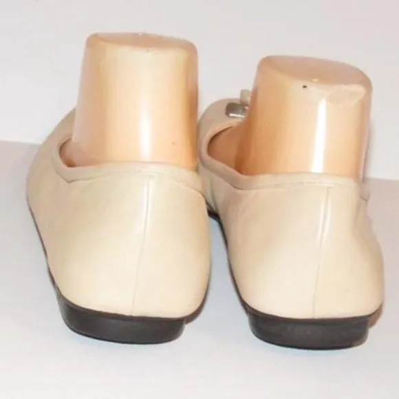 Prada Pink Beige Leather Ballet Flats with an Almond Toe and Bow with Chrome Accents