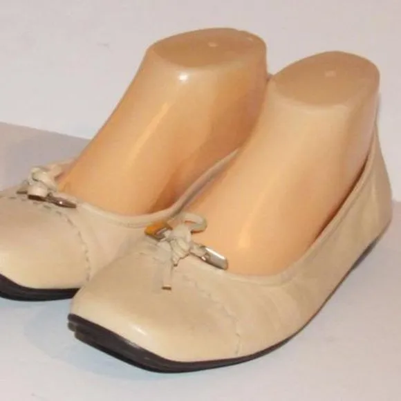 Prada Pink Beige Leather Ballet Flats with an Almond Toe and Bow with Chrome Accents