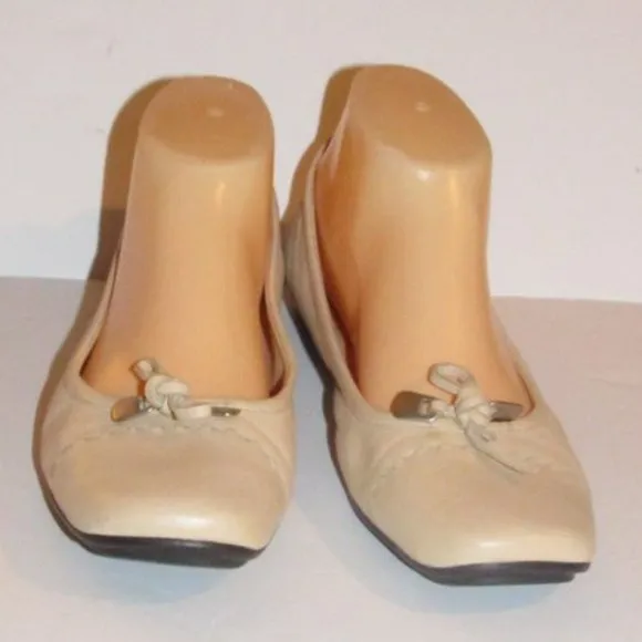 Prada Pink Beige Leather Ballet Flats with an Almond Toe and Bow with Chrome Accents