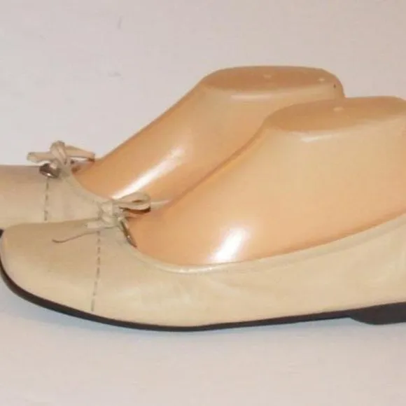 Prada Pink Beige Leather Ballet Flats with an Almond Toe and Bow with Chrome Accents