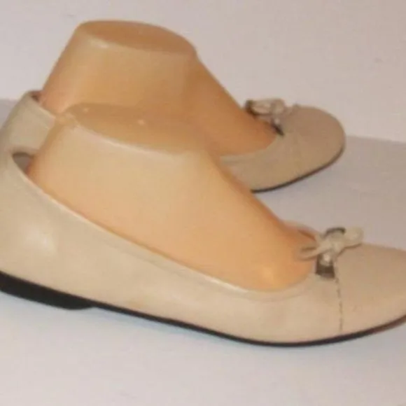Prada Pink Beige Leather Ballet Flats with an Almond Toe and Bow with Chrome Accents