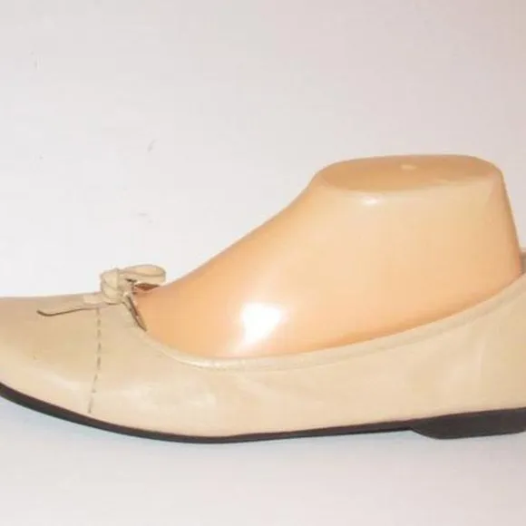 Prada Pink Beige Leather Ballet Flats with an Almond Toe and Bow with Chrome Accents